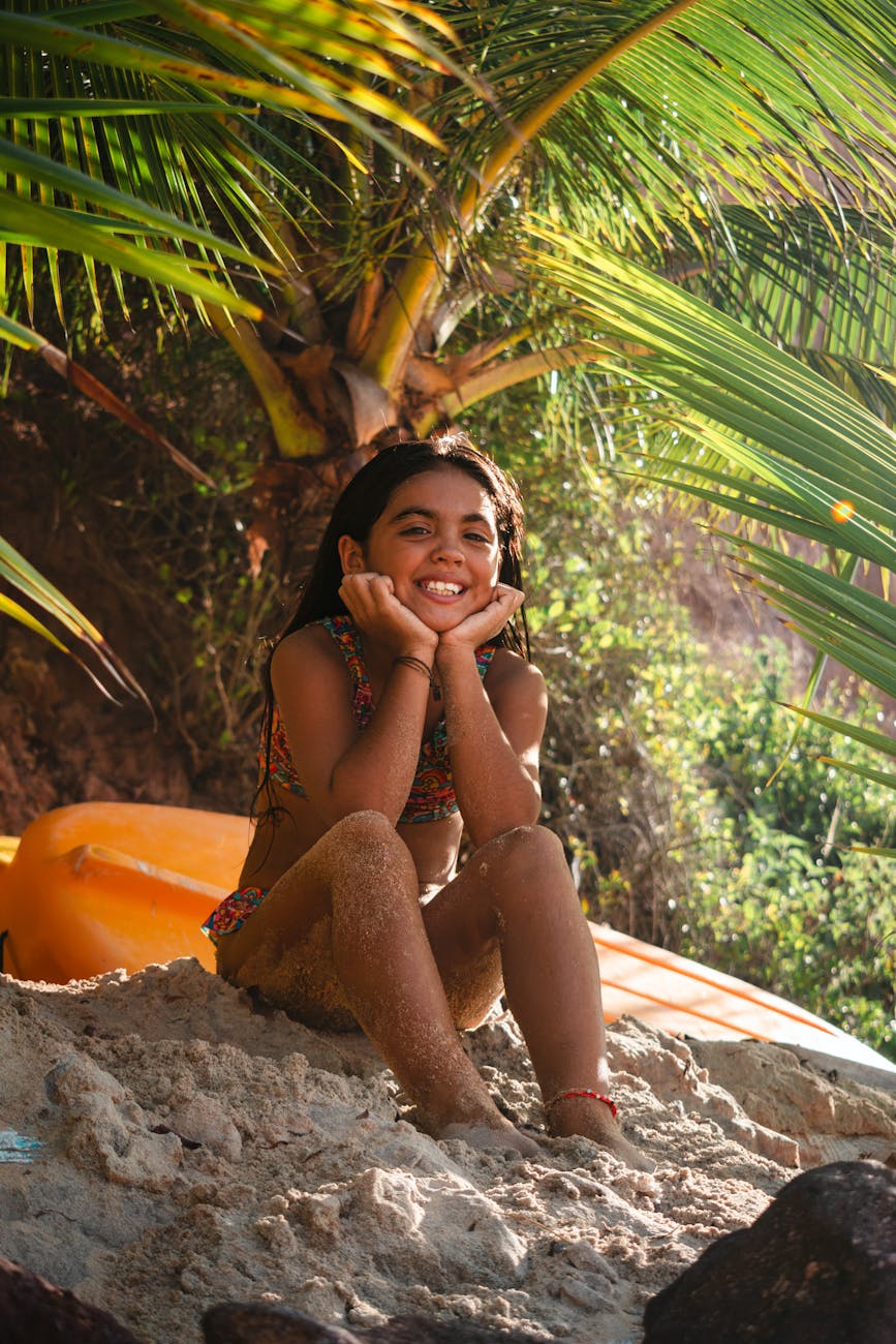child on beach of exotic island